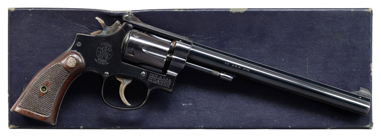 SMITH WESSON MODEL 48 DA REVOLVER.: Cal. 22 MRF. S# K369425. Bbl. 8 3/8" pinned. Patridge front sight. Adjustable square notch rear sight. Early no-dash Model 48 revolver made in 1959. 6-shot recessed cyl. Blued finish with case colored