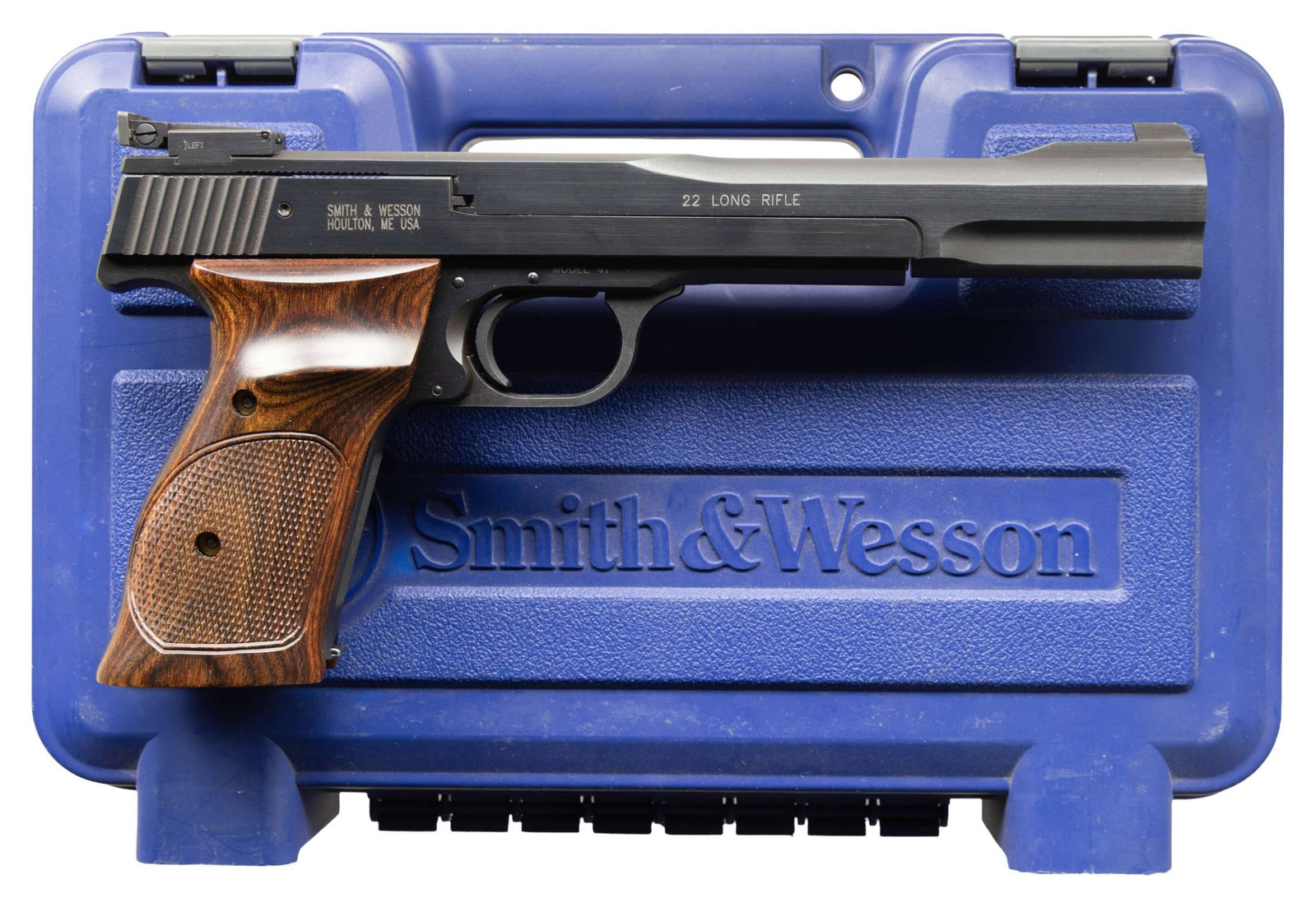 SMITH & WESSON MODEL 41 SEMI AUTO PISTOL.: Cal. 22 LR. S# UCL3216. Bbl. 7". Patridge front sight. Adjustable square notch rear sight. Houlton, ME made Model 41 pistol. Blued finish. Checkered laminated thumbrest grips. MAGS: 2-10 rd. UNATTACHE