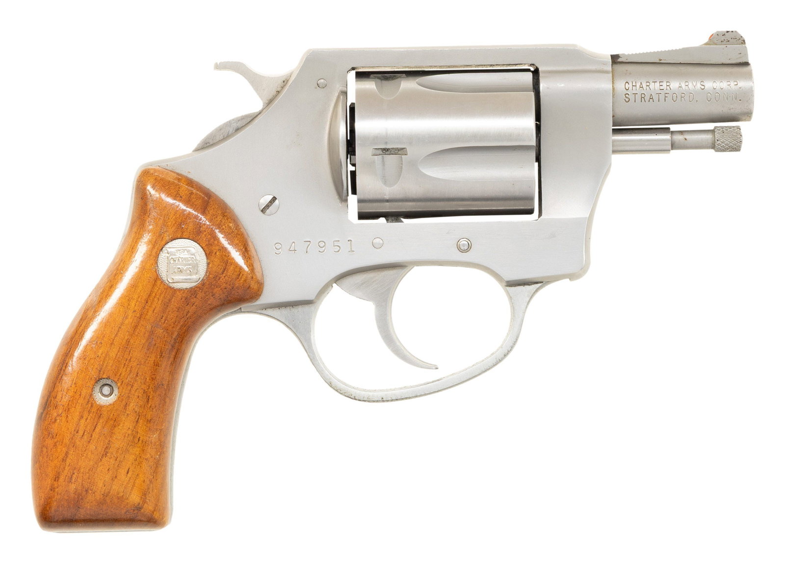 CHARTER ARMS OFF DUTY DA REVOLVER.: Cal. 38 Spl. S# 947951. Bbl. 2". Ramped front sight with red dot. Fixed rear sight. Stratford, CT made revolver. 5-shot cyl. Stainless finish. Hardwood grips with Charter Arms medallions. CONDITION: g