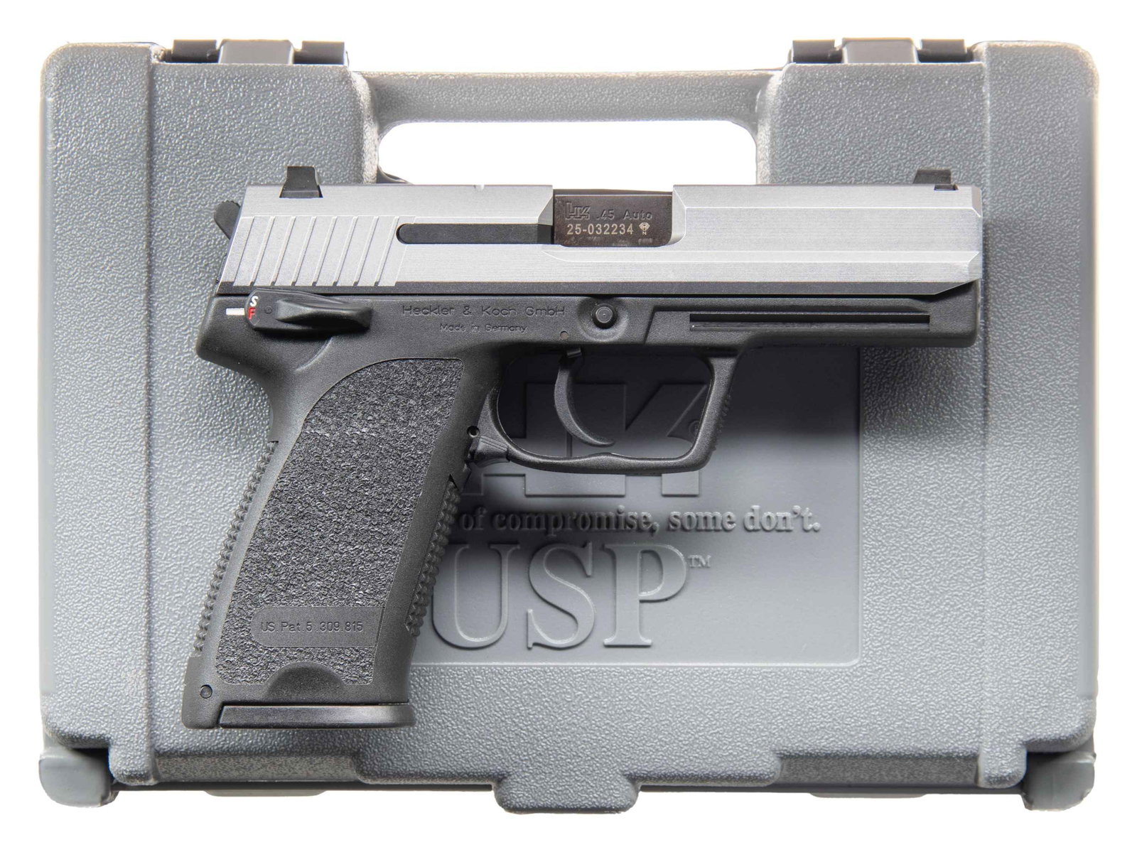 TWO TONE H&K USP 45 SEMI AUTO PISTOL.: Cal. 45 ACP. S# 25-032234. Bbl. 4 1/4". Three dot sights. Variant 2 pistol with manual safety/decocker on right side of frame. Stainless sldie. Black polymer frame with H&K accessory rail. MAGS: 2-10 