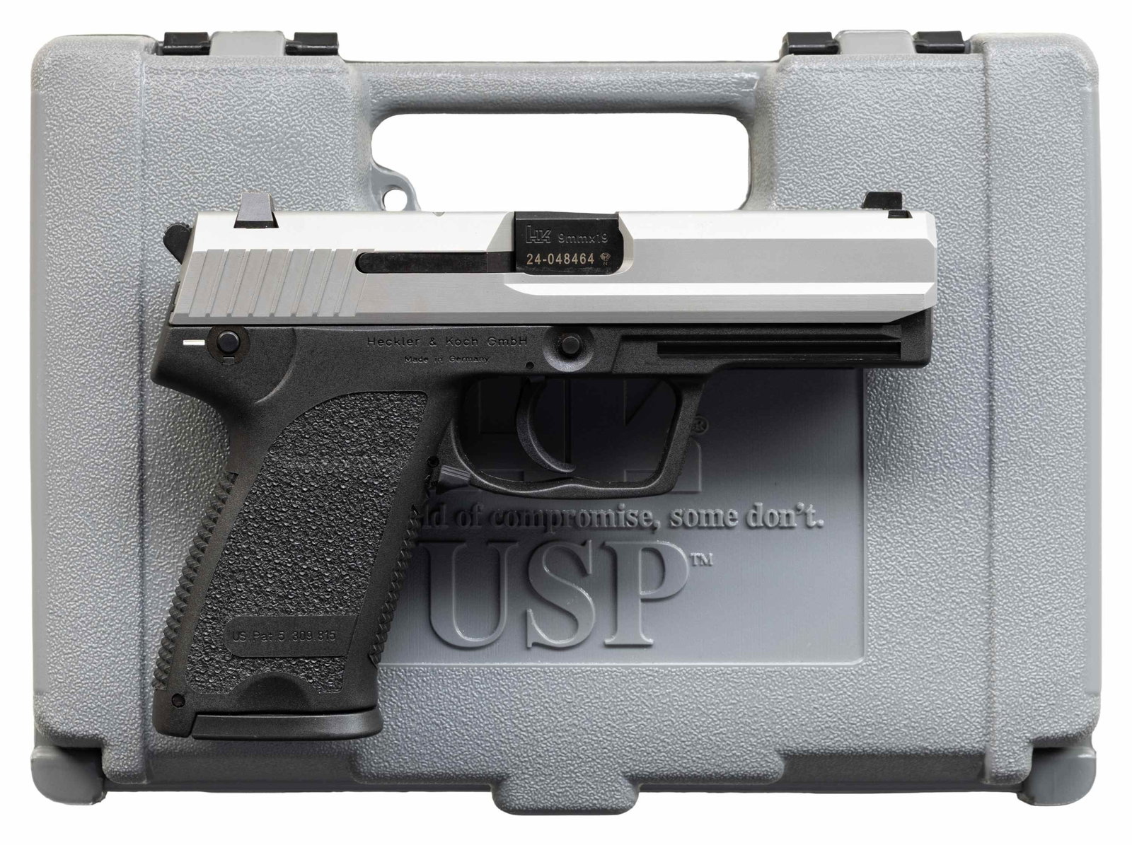 H&K USP SEMI AUTO PISTOL.: Cal. 9x19. S# 24-048464. Bbl. 4 3/8". Three dot sights. 1996 made USP V1 pistol denoted by "KG" date code. Right handed manual safety that also acts as a decocker. Stainless slide. Black polymer frame