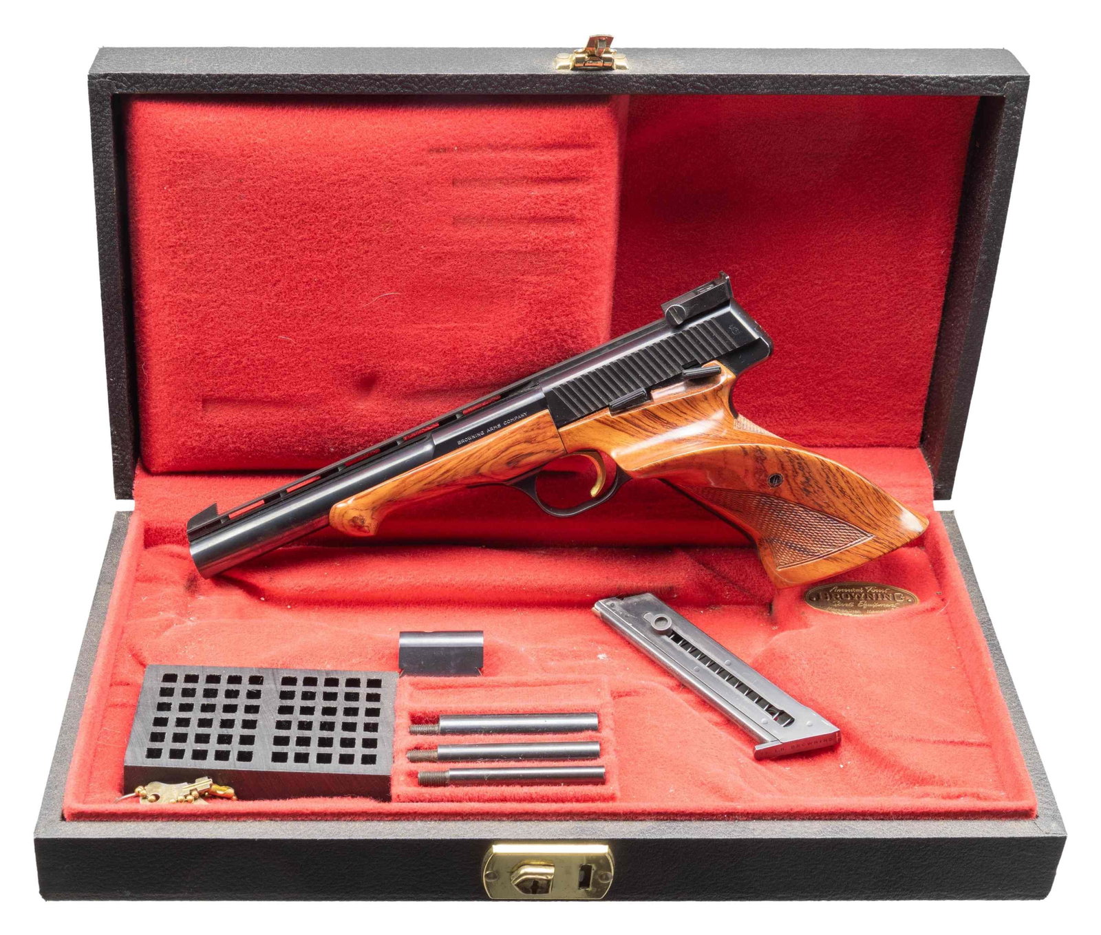 BELGIAN BROWNING MEDALIST SEMI-AUTOMATIC PISTOL: WITH FACTORY CASE & ACCESSORIES. Cal. 22 LR. S# 5518T69. Bbl. 6 3/4". Medalist semi-automatic pistol mfg. in Belgium by Fabrique Nationale and imported by Browning Arms Company in 1969. Left side of t
