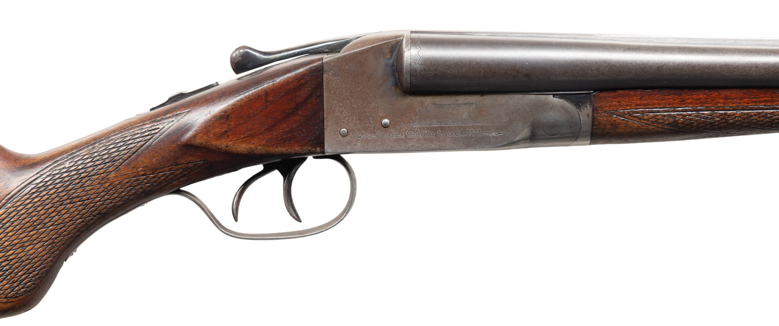 20 GA., ITHACA FLUES MODEL SXS SHOTGUN.: Cal. 20 Ga., 2 3/4". S# 254993. Mfg. 1914. Bbls. 26" w/ brass bead. Full & Cyl. chokes. Boxlock action w/ dbl. triggers & extractors. Walnut checkered stock set. LOP: 13.25" over Ithaca buttplate. CON