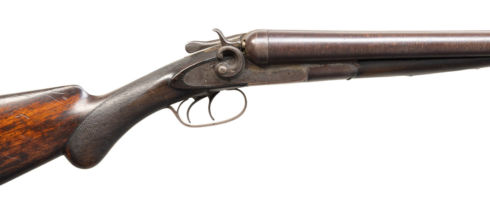 10 GA, ANTIQUE REMINGTON 1889 GRADE 2 HAMMER SXS: SHOTGUN. Cal. 10 Ga. S# 65557. Mfg. 1895. Twist steel 30" bbls. w/ missing front bead. Locks have circular hammers; dbl. triggers & extractors. Walnut stock set. Splinter forearm w/ hard rubber tip &