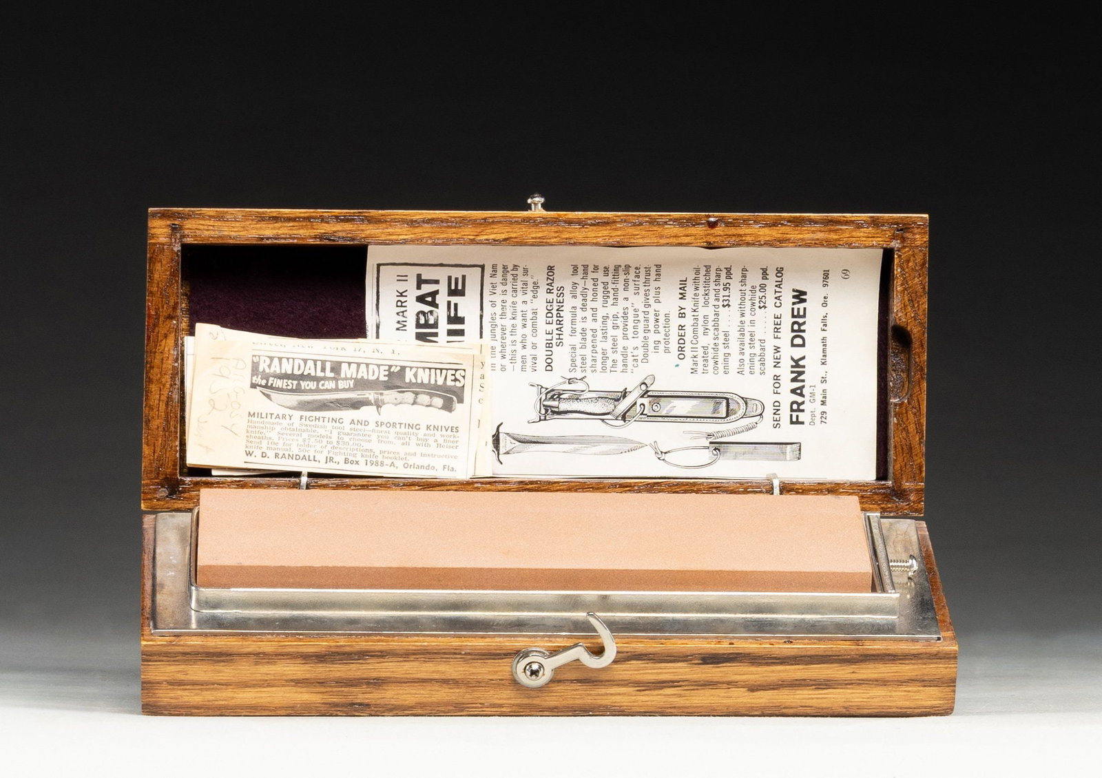 PAIR OF KNIFE SHARPENING STONES IN WOOD CASE. (1 of 2)