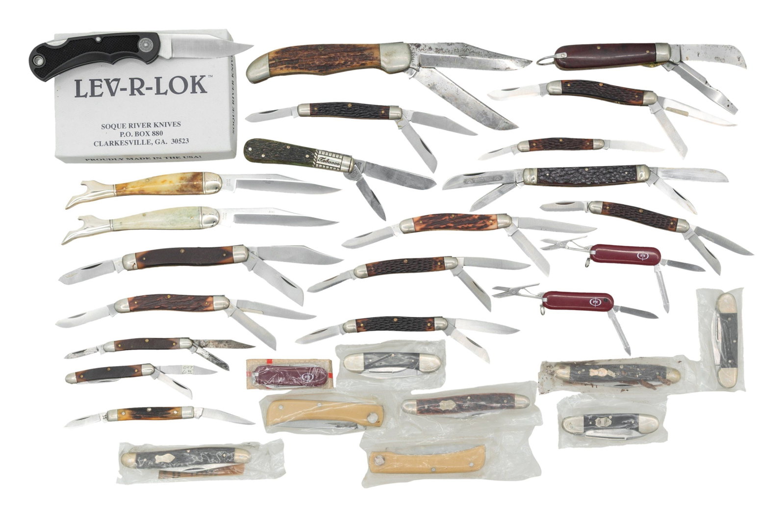GROUP OF 30 POCKET KNIVES.: Knives are mostly unused and like new, including CASE, UNCLE HENRY, S&D CUTLERY, OLD TIMER, STAINLESS, and more, ranging 2.5" to 6" closed. CONDITION: fine overall, most appear like new, several in