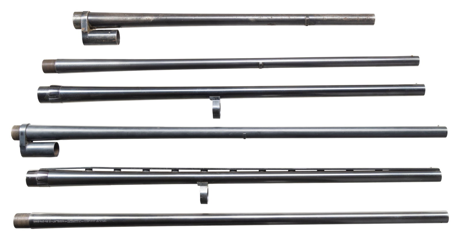 6 WINCHESTER SHOTGUN BARRELS; MODELS 97, 12 AND: 1300 XTR. 1). MODEL 1300 XTR 12 Gauge 3". Plain 26" Imp. Cyl. with silver bead sight. CONDITION: appears new and unused. 2). MODEL 1300 XTR. Same as #1 but vent ribbed and Mod. choked. 3). MODEL 12