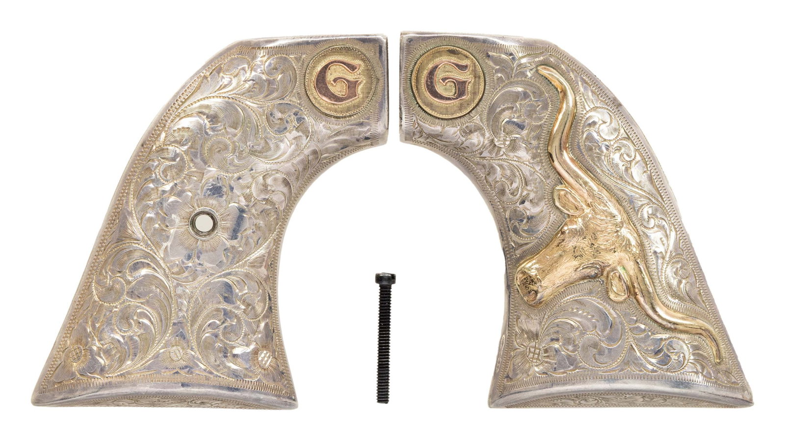 BOHLINMADE BURBANK,CA STERLING COLT SAA STEERHEAD: GRIPS. Attractive foliate scroll engraved sterling silver steer's head grips with G medallion. Contrasting gold plated steer head and medallion make a beautiful accent to this well executed set of