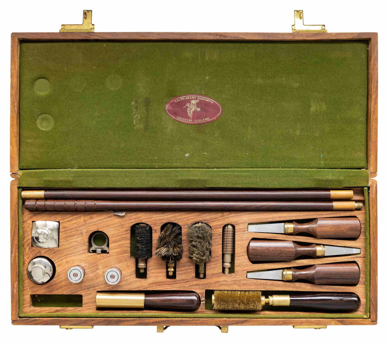 RALPH GRANT & SONS PRESENTATION STYLE GUN CLEANING: KITS. 20" x 8" x 3" case. Case contains various rosewood & teak wood handles items including:3 Piece cleaning rod.2 cal. 12 Ga. snap cap.2 oil bottles.key3 turn screws.3 Mops & broken shell extractor.