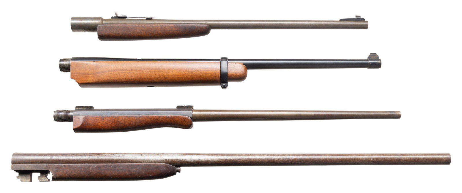 4 BARRELS WITH FORENDS; 3 RIFLE AND 1 SHOTGUN.: 1). RUGER No. 3 Bicentennial in 22 Hornet caliber. Length of 22" with banded brass bead front sight; missing rear sight. Factory drilled and tapped for scope bases. Bicentennial marked and without