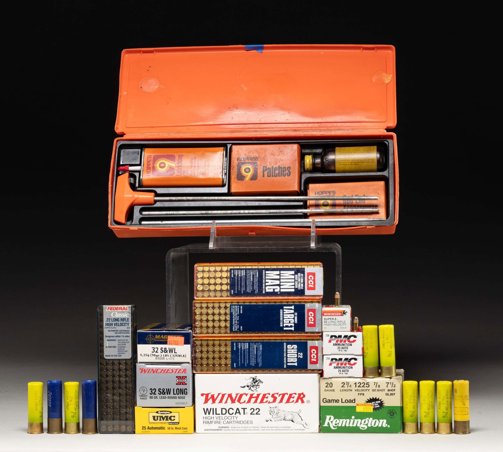 CLEANING KIT & MISC. AMMO.: Hoppies Gun cleaning kit with oil & rods.AMMO (contains hollow point ammo): 2 Boxes (100 rds.) CCI, 22 Short; 1 is target ammo.1 Brick & 1 Box (550 rds.) Winchester Wildcat, 22 LR, high velocity.1