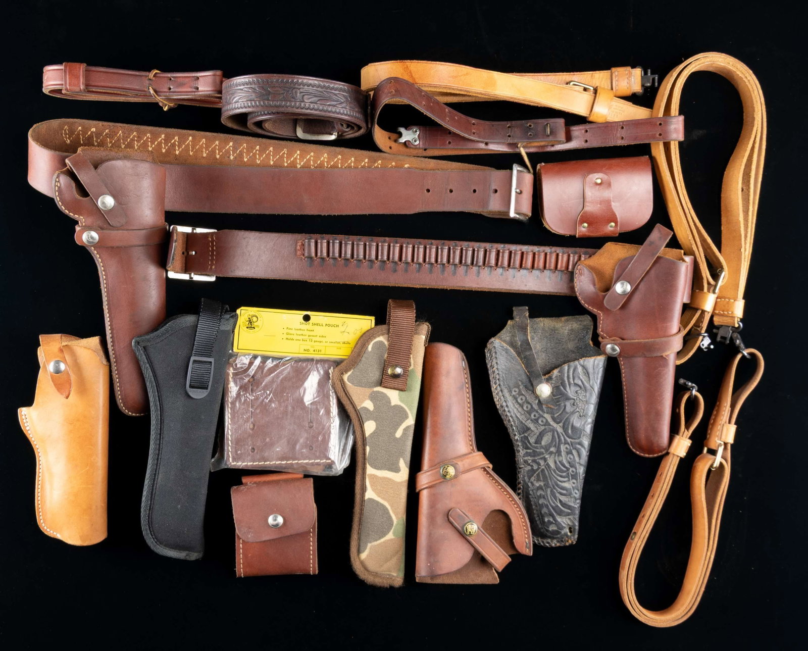 SLINGS, HOLSTERS, BELTS & ACCESSORIES.: All items are very good to excellent unless noted. 3 light tan 1" Latigo rifle slings with detachable swivels. / Hunter brand 1" sling. / Part of 1" military style sling adapted for sporting use. / Hu