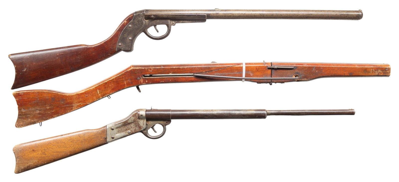 DAISY 20th CENTURY, MARKHAM AND KING ANTIQUE AIR: GUNS. 1) DAISY 20th CENTURY 3rd VARIANT SHEET METAL AIR GUN. Cal. 180/BB. NSN. Bbl. loading single shot. Action breaks at wrist for loading. Nickel finished sheet metal construction. Left side of
