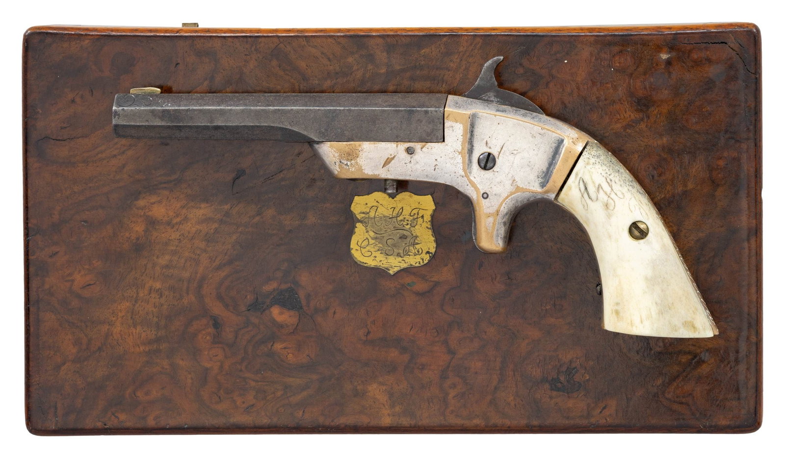 "A WURFFLEIN" MARKED DERRINGER PISTOL.: Cal. 28. S# 109. Bbl. 3 11/16". Single shot derringer pistol produced by an unknown mfg. The top flat of the octagonal bbl. is marked A WURFFLEIN PHILA", which appears to have been added at a later