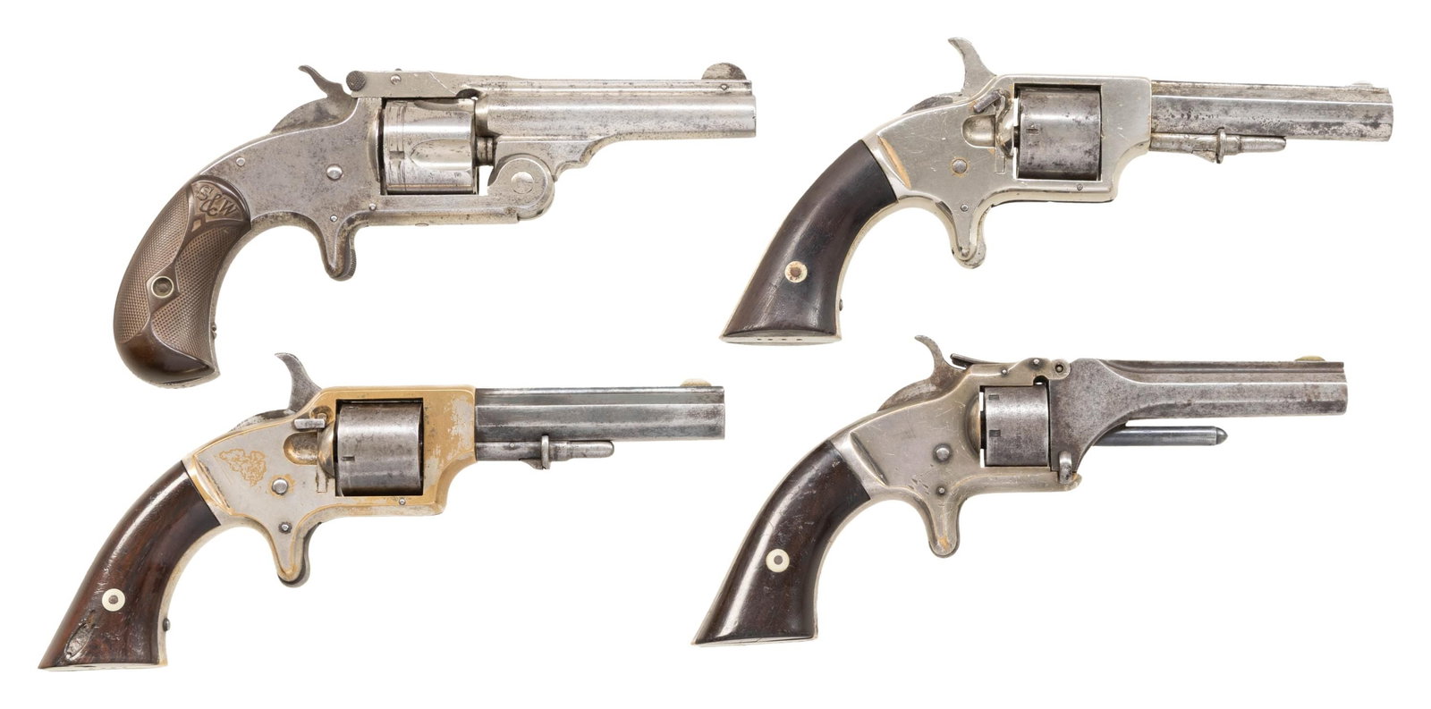 FOUR SMITH & WESSON OR SPRINGFIELD ARMS CO. SINGLE: ACTI0N REVOLVERS. 1) S&W No. 1 Second Issue. Standard model with 1855, 1859 & 1860 patent dates on the cylinder. Cal. 22 short RF. S# 65457. 3 3/16" bbl. with rib & semi-circular sight. Round 7 shot