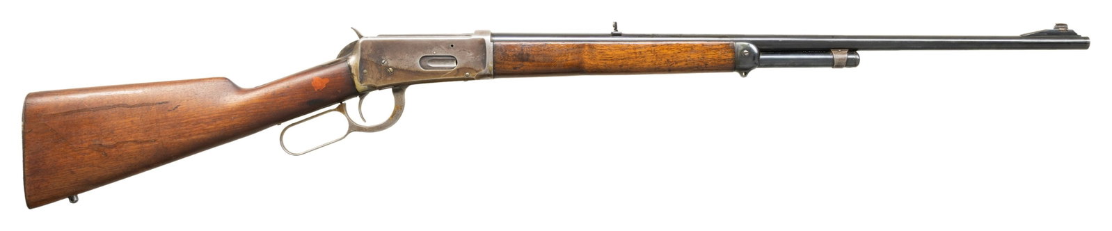 CUSTOMIZED ANTIQUE WINCHESTER MODEL 1894 LEVER: ACTION RIFLE. Cal. 30-30. S# 144093. Bbl. 24 1/4". Model 1894 lever action rifle mfg. by Winchester in 1897. Left side of the Model 64 replacement bbl. exhibits standard markings denoting Winchester's