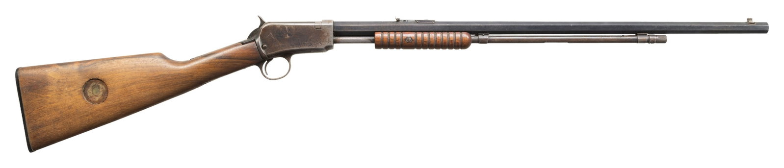 WINCHESTER M90 SLIDE ACTION RIFLE.: Cal. 22 WRF. S# 775115. Mfg. 1928. Bbl. 24" Oct.. Dovetailed bead front sight. Custom butt stock. CONDITION: overall fair-poor. 70% orig bbl blue with spotty oxidation and numerous handling marks. 30%