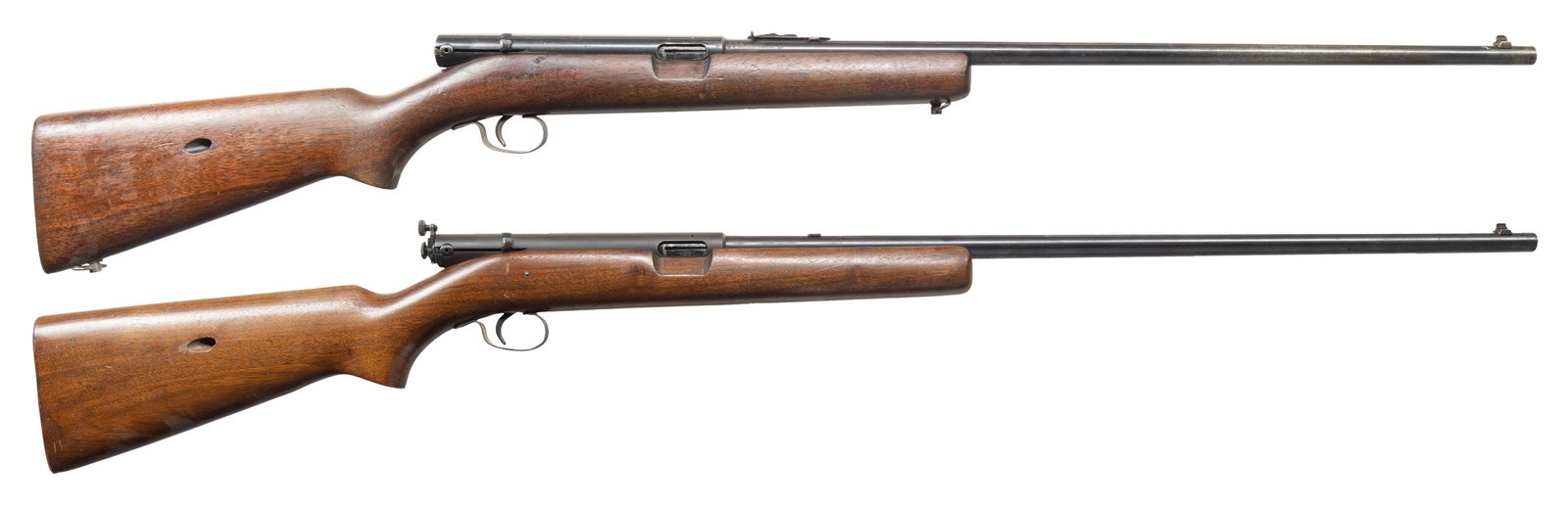 2 WINCHESTER M74 SEMI AUTO RIFLES.: 1. BRITISH PROOFED. Cal. 22 LR. S# 103816. Mfg. 1941. Bbl. 24" with dovetailed bead front sight. Elevator adj rear sight. Smooth pistol grip stock with checkered steel buttplate. CONDITION: Overall fa