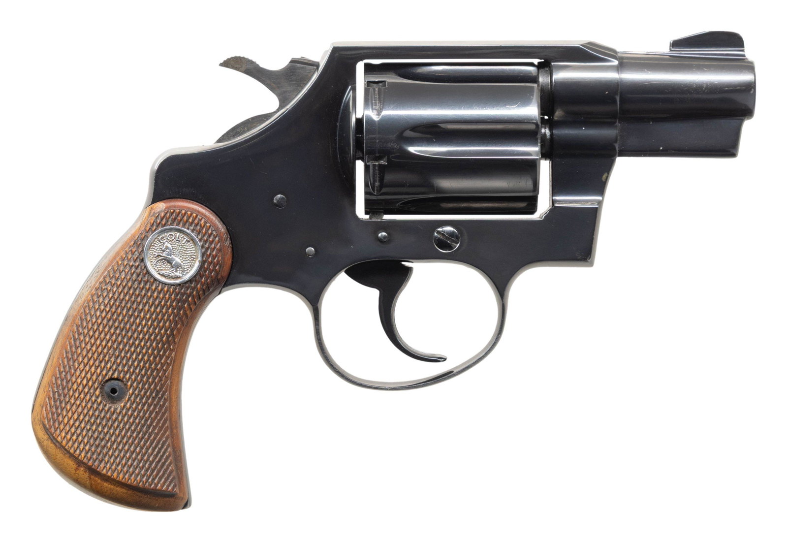 CUSTOM COLT DETECTIVE SPECIAL DA REVOLVER.: Cal. 38 spl. S# 811320. Bbl. 2" unmarked custom with shroud and further customized with a birds head shaped grip. Checkered Colt medallion custom grips. CONDITION: overall very fine as refinished. Ver
