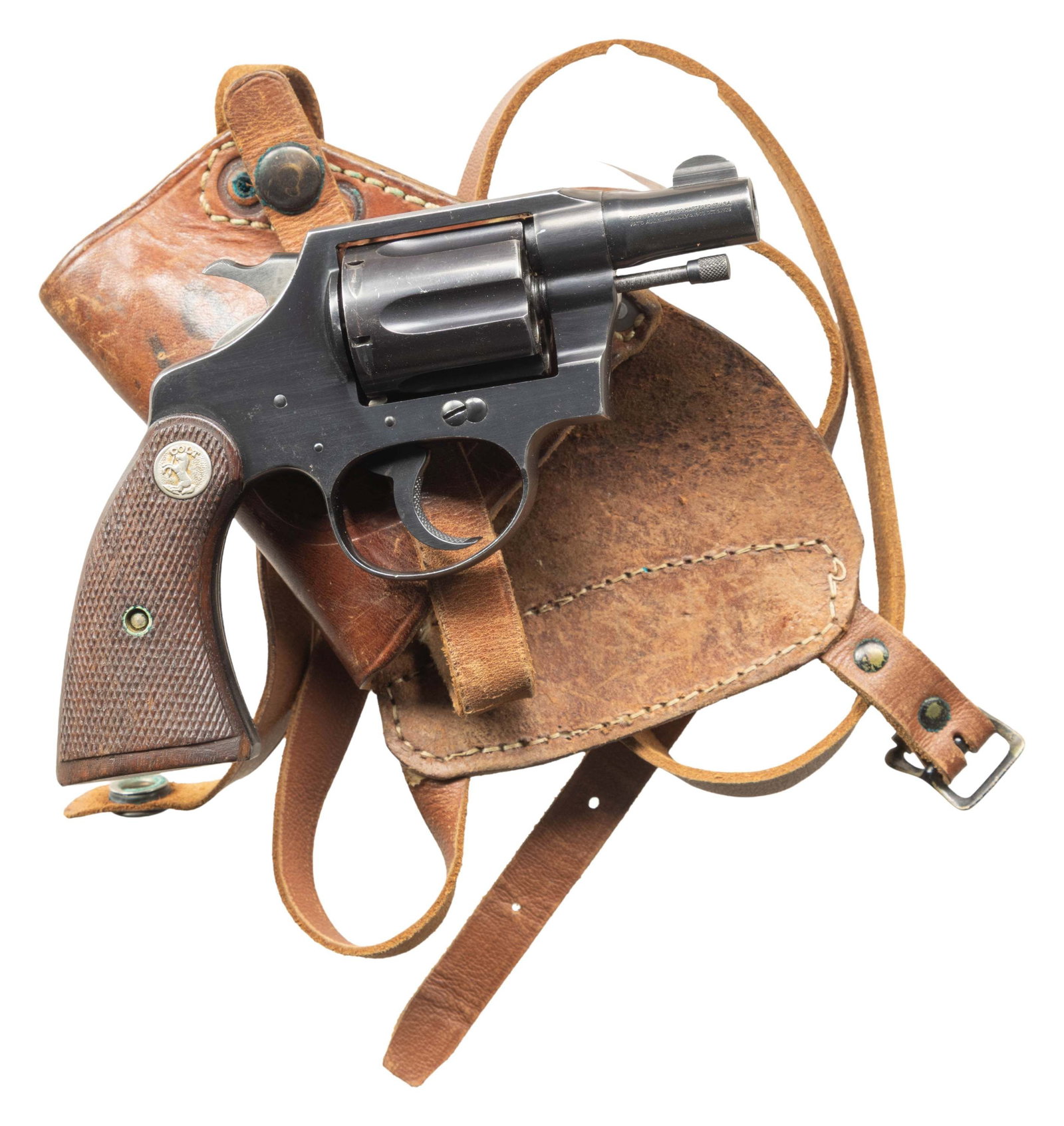 WARTIME COLT DETECTIVE SPECIAL DOUBLE ACTION: REVOLVER WITH HOLSTER. Cal. 38 Spl. S# 477402. Bbl. 2". Detective Special double action revolver mfg. by Colt in 1942. Left side of the bbl. is marked "38", followed by "DETECTIVE/ SPECIAL", with Colt