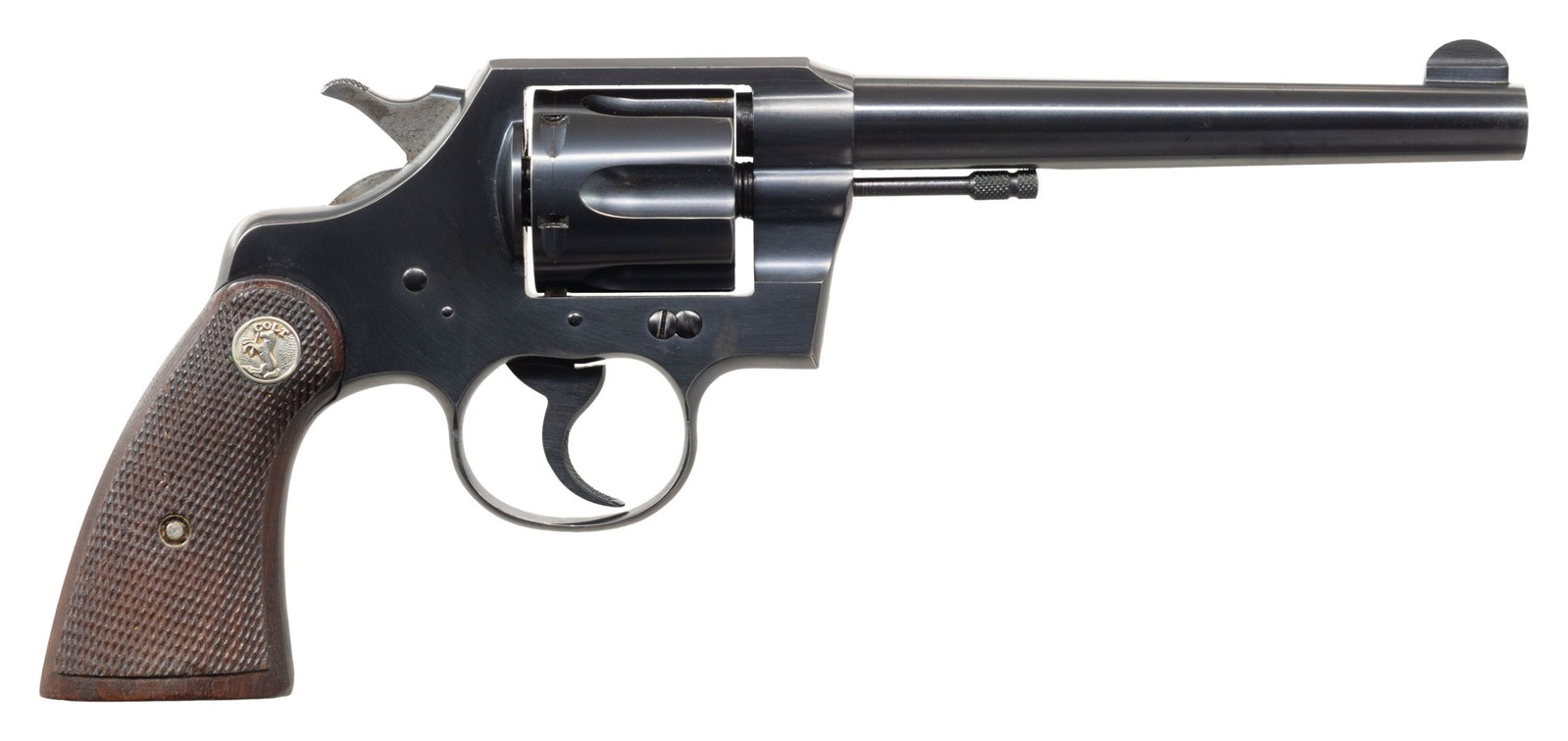 COLT HEAVY BARREL OFFICIAL POLICE DA REVOLVER.: Cal. 38 Spl. S# 709454. Mfg 1943. Bbl. 6" fixed blade front sight. Frame integral square notch rear sight. Checkered walnut colt medallion grips. CONDITION: overall very good. Over 95% orig blue finis