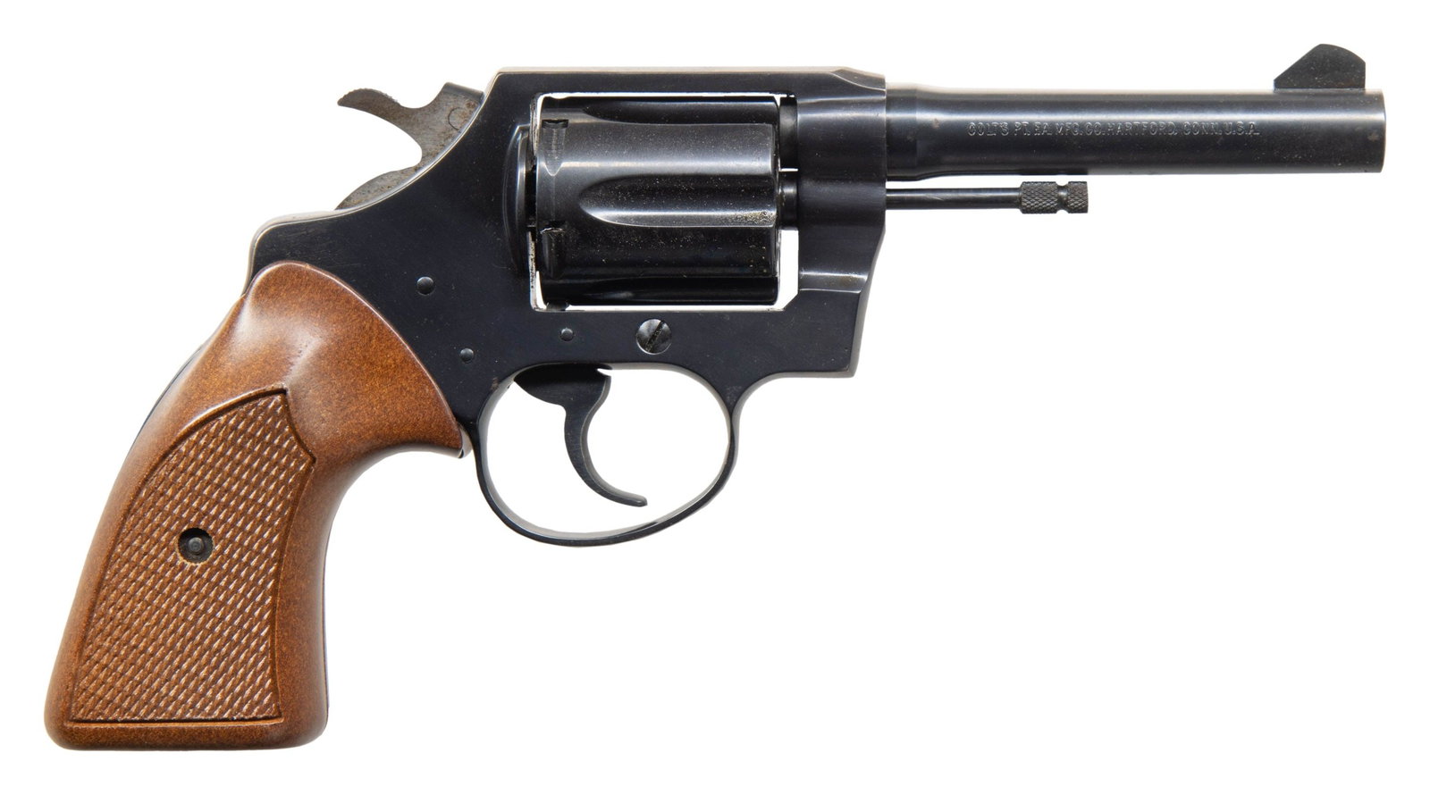 COLT POLICE POSITIVE SPECIAL DA REVOLVER.: Cal. 38 Spl. S# B56821. Mfg. 1972. Bbl. 4". Fixed blade front sight. Frame integral square notch rear sight. Checkered wrap around replacement walnut grips. CONDITION: overall very fine. Metal retains