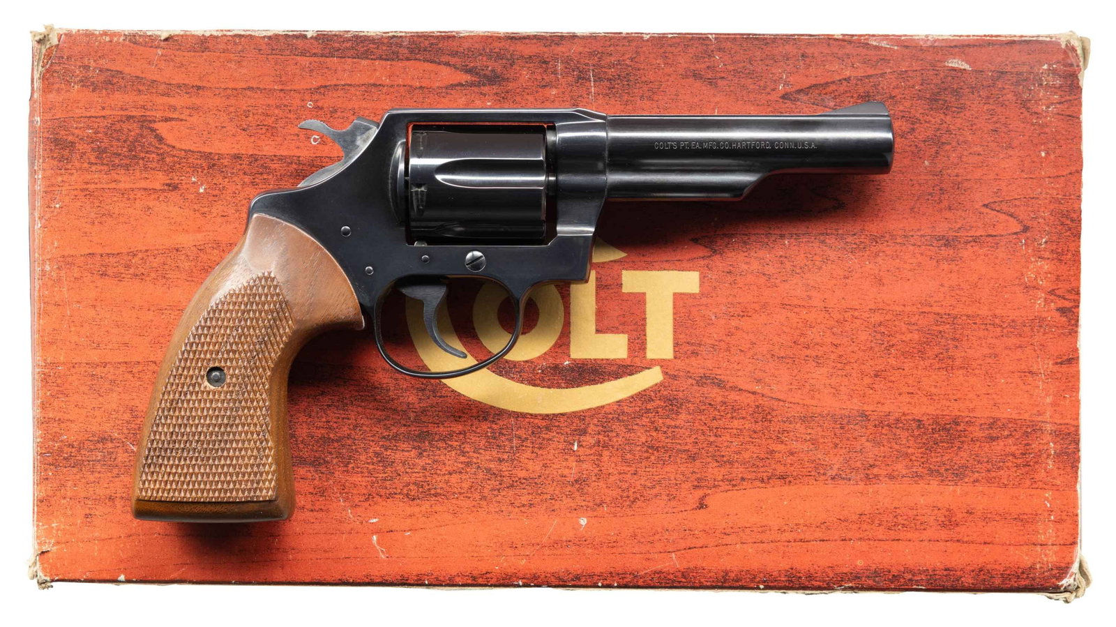 COLT POLICE POSITIVE DA REVOLVER WITH BOX.: Cal. 38 Spl. S# S13997. Mfg. 1979. Bbl. 4" with fixed blade front sight. Frame integral square notch rear sight. Checkered walnut grips. UNATTACHED ACCESSORIES. orig box CONDITION: all aspects are ver
