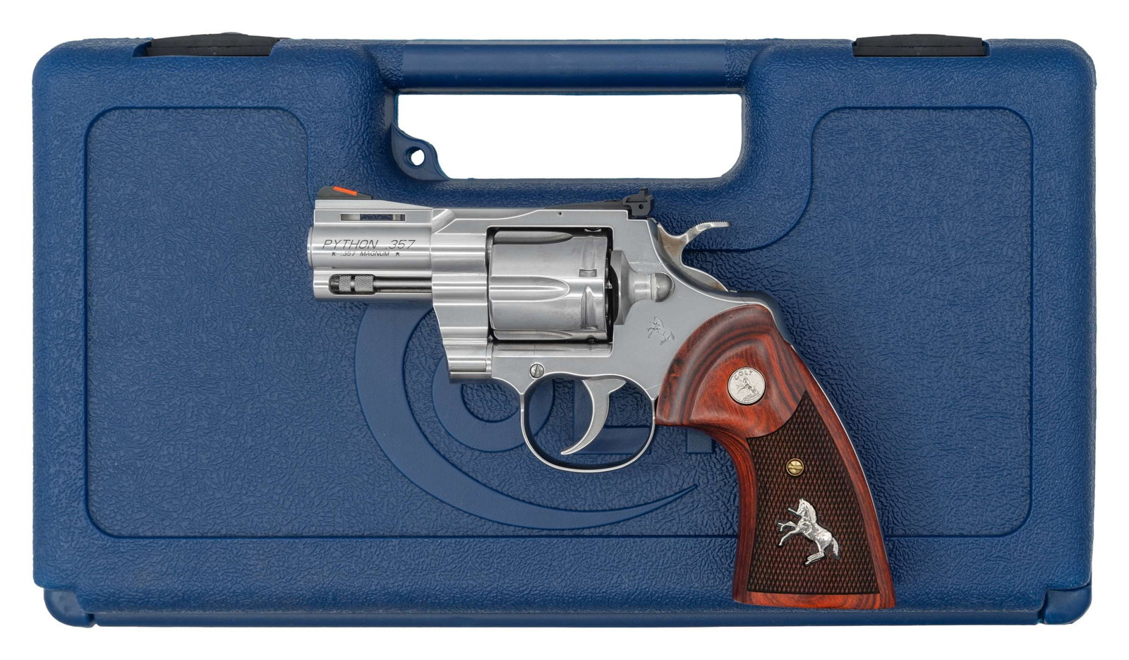 STAINLESS STEEL COLT PYTHON DOUBLE ACTION REVOLVER: WITH MATCHING FACTORY HARD CASE. Cal. 357 Mag. S# PY369511. Bbl. 2 1/2". Python double action revolver mfg. by Colt. Left side of the bbl. is marked with the model and cal. designations, with the