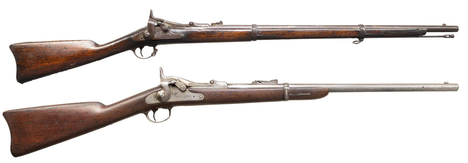 2 SPRINGFIELD TRAPDOOR RIFLES.: 1. SPRINGFIELD M1866 2ND ALLIN CONVERSION. Cal. 50-70. NSN. Bbl. 28 7/8". Rifle has been shortened, likely for school or cadet use. Folding leaf rear sight. Stud type front sight. Breech block is