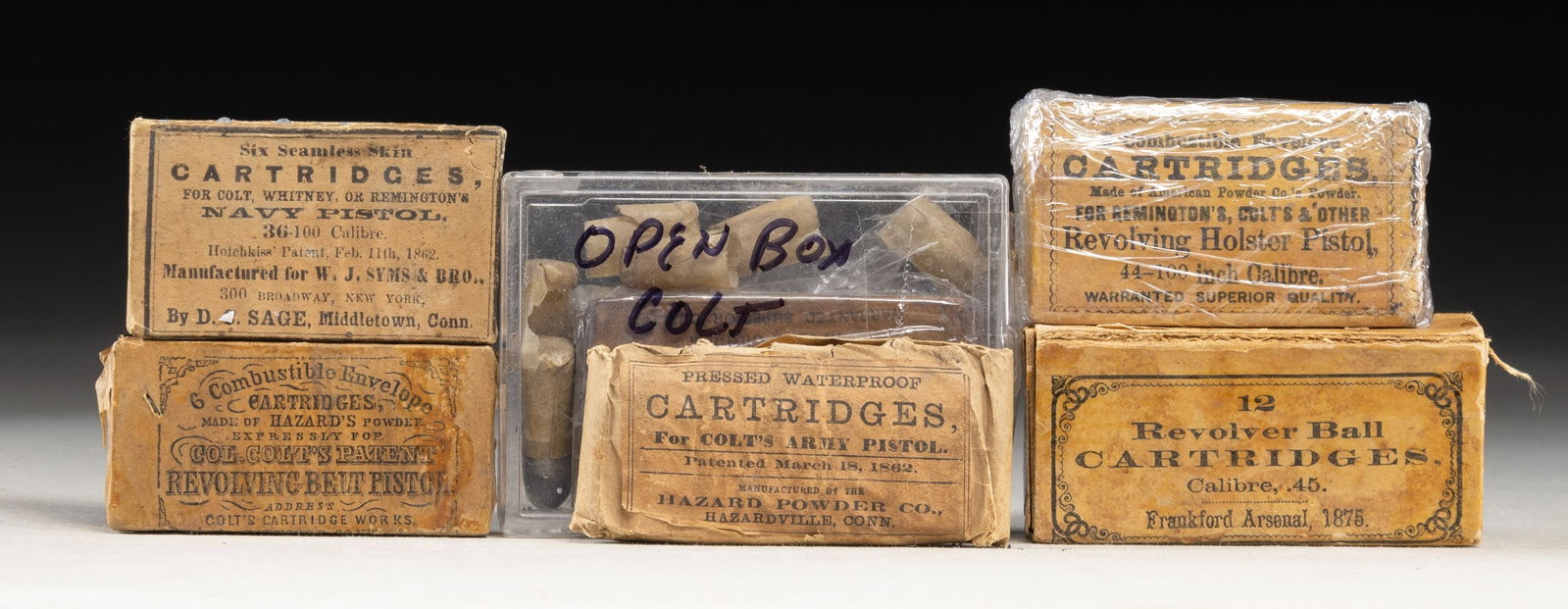 LOT OF 6 ASSORTED U.S. CIVIL WAR REVOLVER: AMMUNITION PACKS. Lot of 6 U.S. Civil War revolver ammunition packs, including: 1) 6-rd. pack of .44 caliber ammunition mfg. for Colt's Model 1860 Army revolver by Hazard Powder Co. Paper envelope