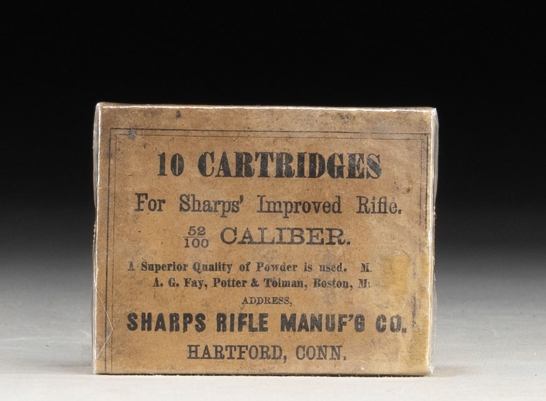 SEALED BOX OF U.S. CIVIL WAR ERA SHARPS .52-100: LINEN CARTRIDGES. Sealed 10-rd. box of U.S. Civil War era .52-100 Sharps ammunition mfg. by Sharps Rifle Manufacturing Company. 2-piece box is comprised of pasteboard, featuring a label on the lid