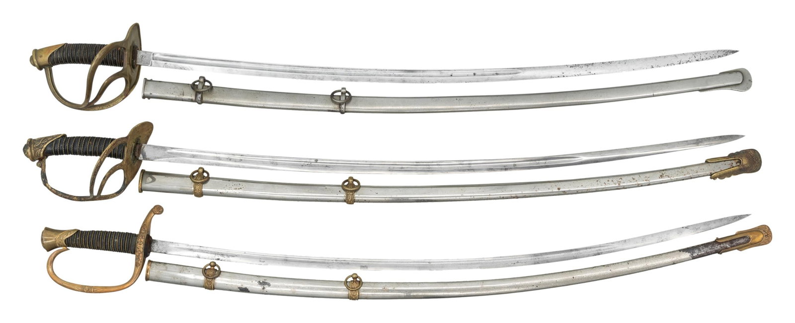 3 POST CIVIL WAR US SWORDS.: 1) US M1872 enlisted Cavalry saber measuring 38 1/4" overall with a plain single fullered 31 3/4" blade marked on the ricasso " 5 GERMANY ". Plain brass hilt with a 2-branch guard. Wire wrapped leathe