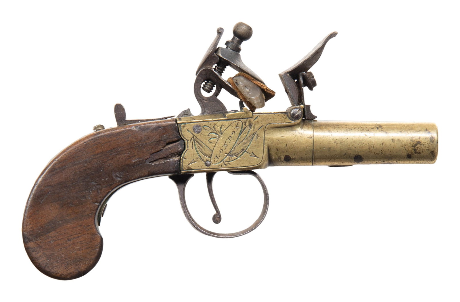 BRITISH BRASS CENTER HAMMER FLINTLOCK PISTOL, BY: JOVER. Cal. 42 Smoothbore. NSN. Bbl. 1 7/8". Brass center hammer flintlock pistol mfg. in Britain by Jover. Sides of the frame are each engraved with a panoply, with "JOVER" within an oval on the