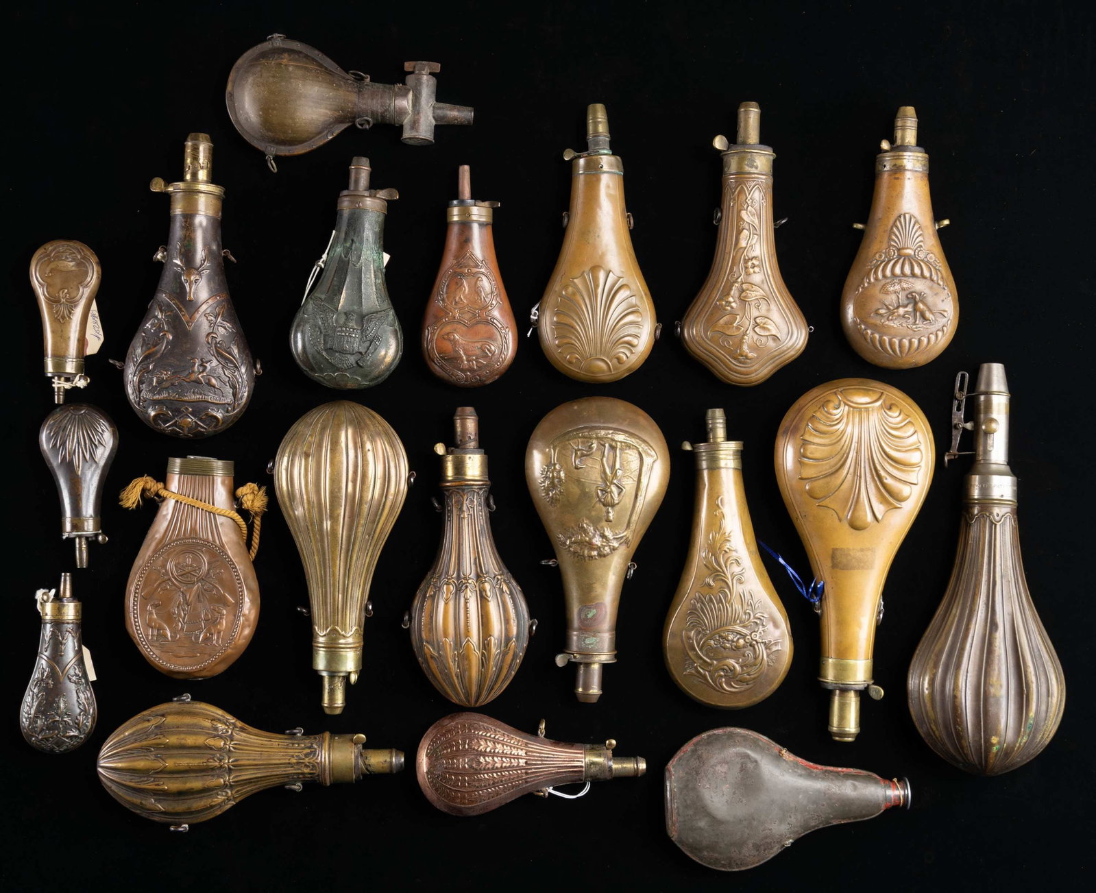 GROUP OF 20 VINTAGE DECORATED POWDER FLASKS. (1 of 2)