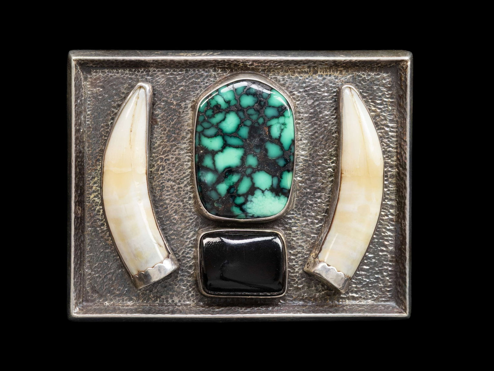 CONTEMPORARY DESIGN NAVAJO STERLING TURQUOISE BELT: BUCKLE. Unknown signature, eclectic design with large piece of inset spider web turquoise, onyx, 2 canine teeth (boar?), 72 grams. CONDITION: good. (02-27027-1/JS). NON-GUN. $200-400.
