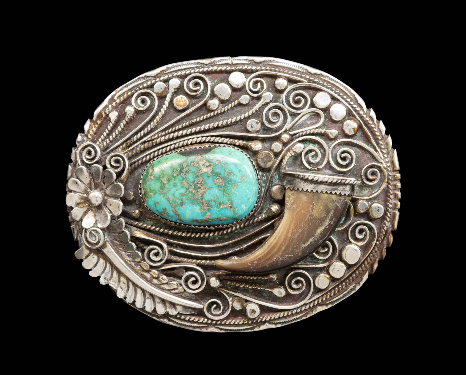 SIGNED SILVER NAVAJO TURQUOISE & BEAR CLAW BELT: BUCKLE. 3.5" x 3" oval decorated turquoise & bear claw, indecipherable signature signed, 98 grams. CONDITION: good. (02-27028-3/JS). NON-GUN. $200-400.