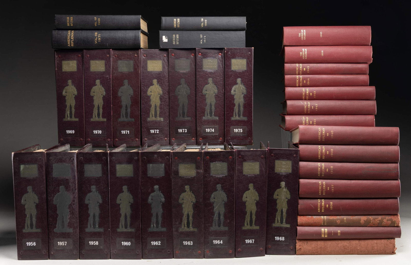 INTERESTING GROUP OF VINTAGE AMERICAN RIFLEMAN: MAGAZINES. The magazines are bound both as books and in three-ring binders. Most years are complete, except as noted. The book bound volumes with official embossing of title and year on the binding,