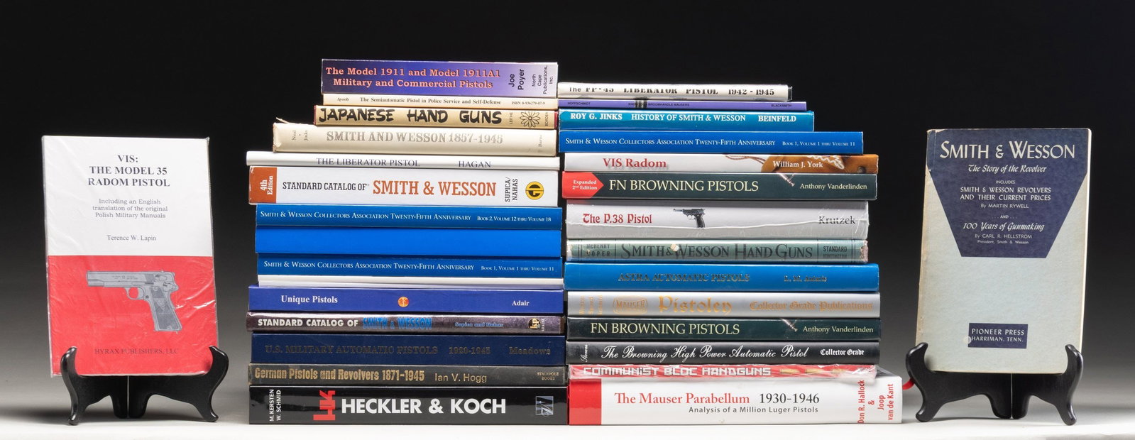 GROUPING OF PISTOL RELATED FIREARMS REFERENCE: BOOKS. Books are both hard and soft cover. Notable titles include: 1.) The Liberator Pistol. by Hagan. 2.) U.S. Military Automatic Pistols. by Meadows. 3.) Mauser Pistolen. by Weaver, Speed and