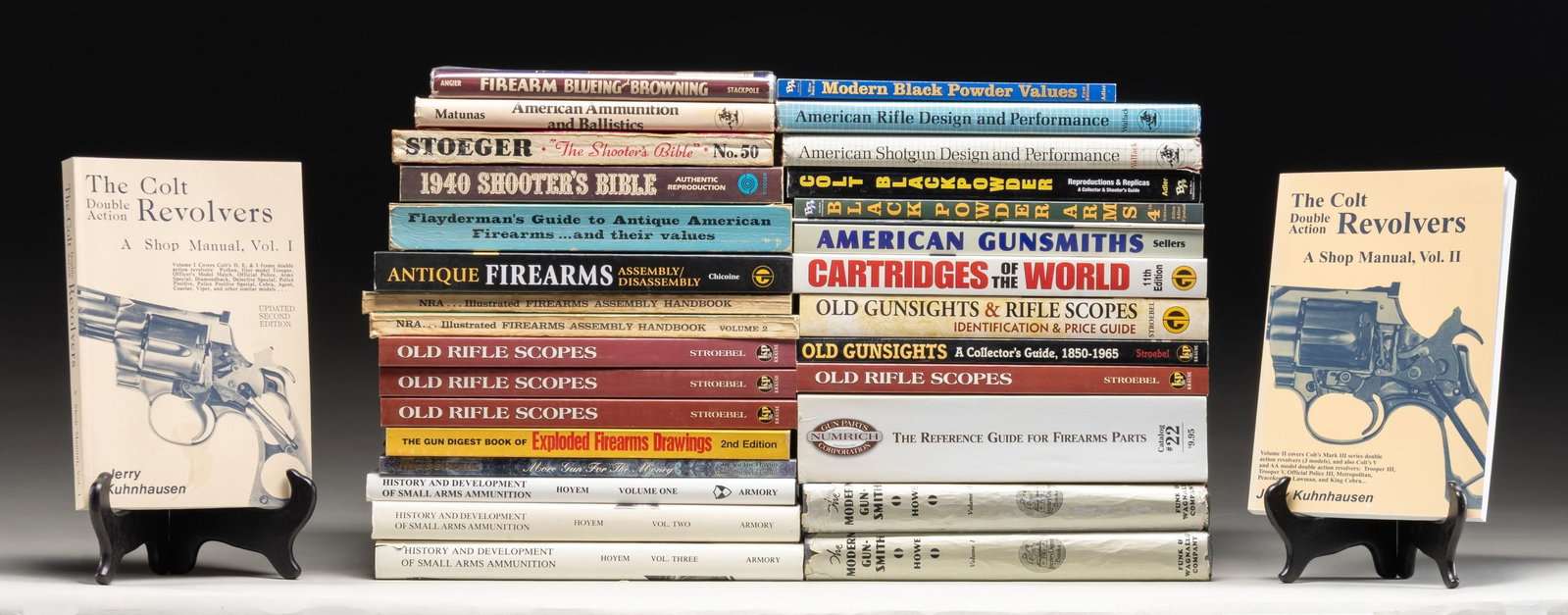 GROUP OF FIREARMS AND GUNSMITHING RELATED: REFERENCE BOOKS. Many volumes are soft-cover. Notable hard-cover volumes include: 1.) History And Development of Small Arms Ammunition by Hoyem. Volumes 1, 2 & 3. / 2.) The Modern Gunsmith by Howe.