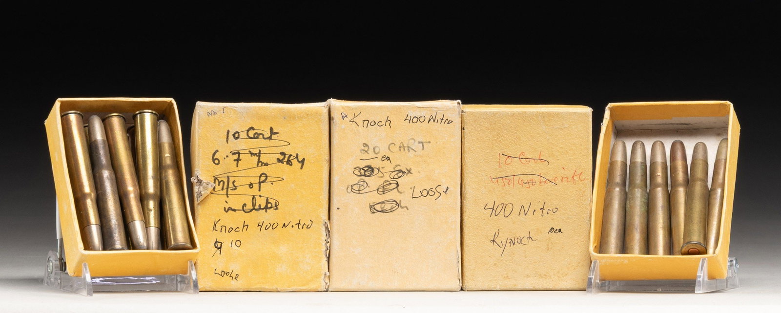 LOT OF ABOUT 50 RDS. OF 400 NE AMMO.: This lot consists of about 50 rds. of varied 400 Nitro Express ammo. Ammo is housed in plain modern boxes. CONDITION: boxes show varying degrees of wear & a couple are missing lids. Ammo shows