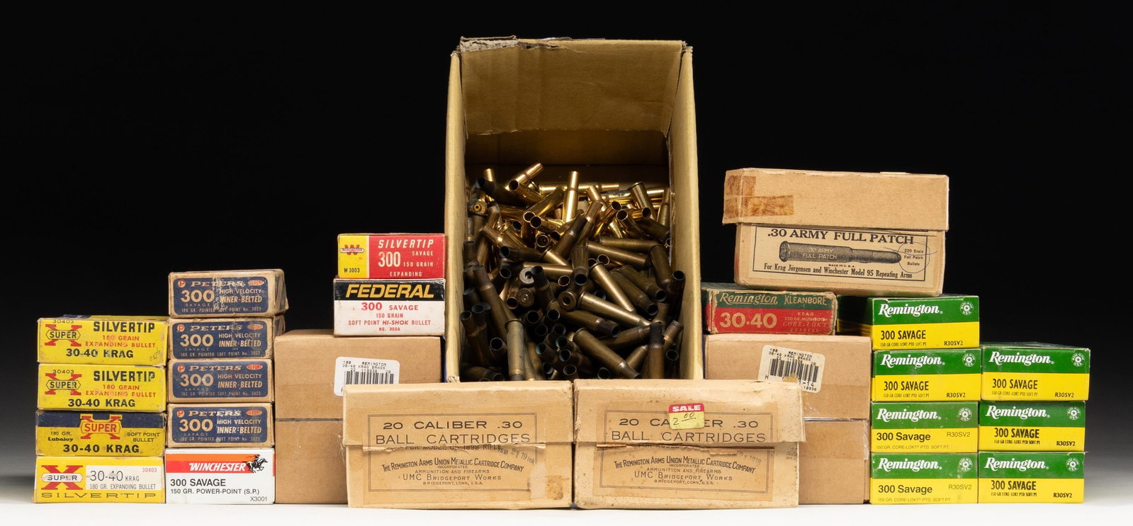 GROUPING OF 300 SAVAGE AND 30-40 KRAG RIFLE: AMMUNITION. Lot contains hollow points. Group consists of: 300 SAVAGE: 1.) Remington. 7 boxes of 20. 150 grain soft point. / 2.) Peters. 4 boxes of 20. 150 grain soft point. / 3.) Winchester. 1 box of
