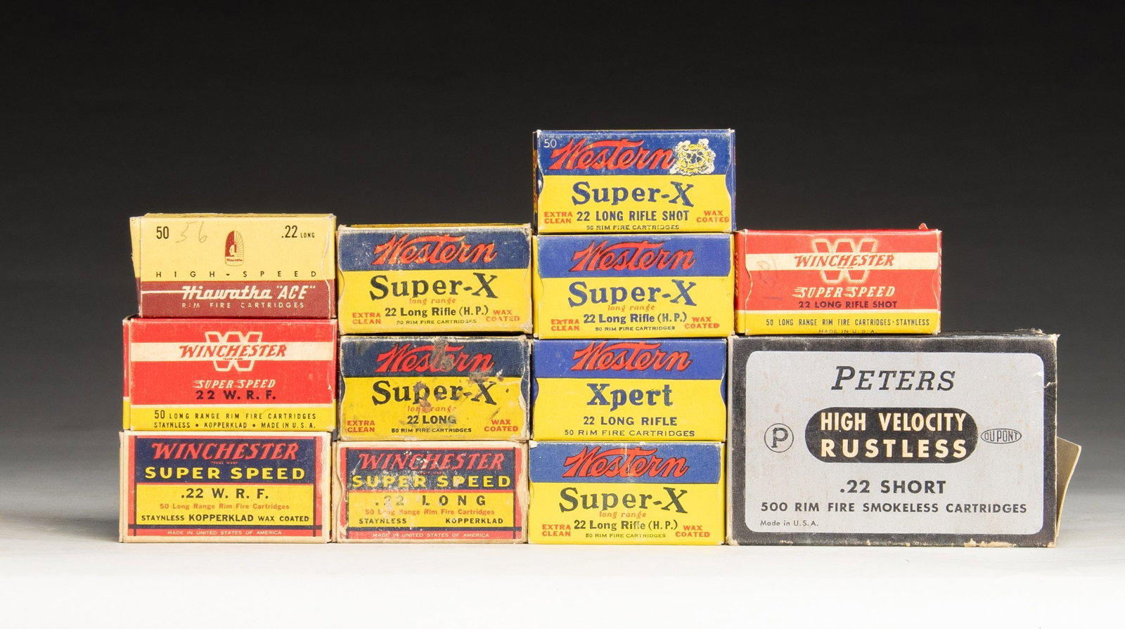 INTERESTING GROUP OF .22 CALIBER RIMFIRE SPORTING: AMMUNITION. Group contains hollow points. 22 WRF: 1.) Winchester Super-Speed. Blue and yellow box of 50. / 2.) Winchester Super-Speed. Red and yellow box of 50. / 22 LONG RIFLE: 1.) Western Super-X