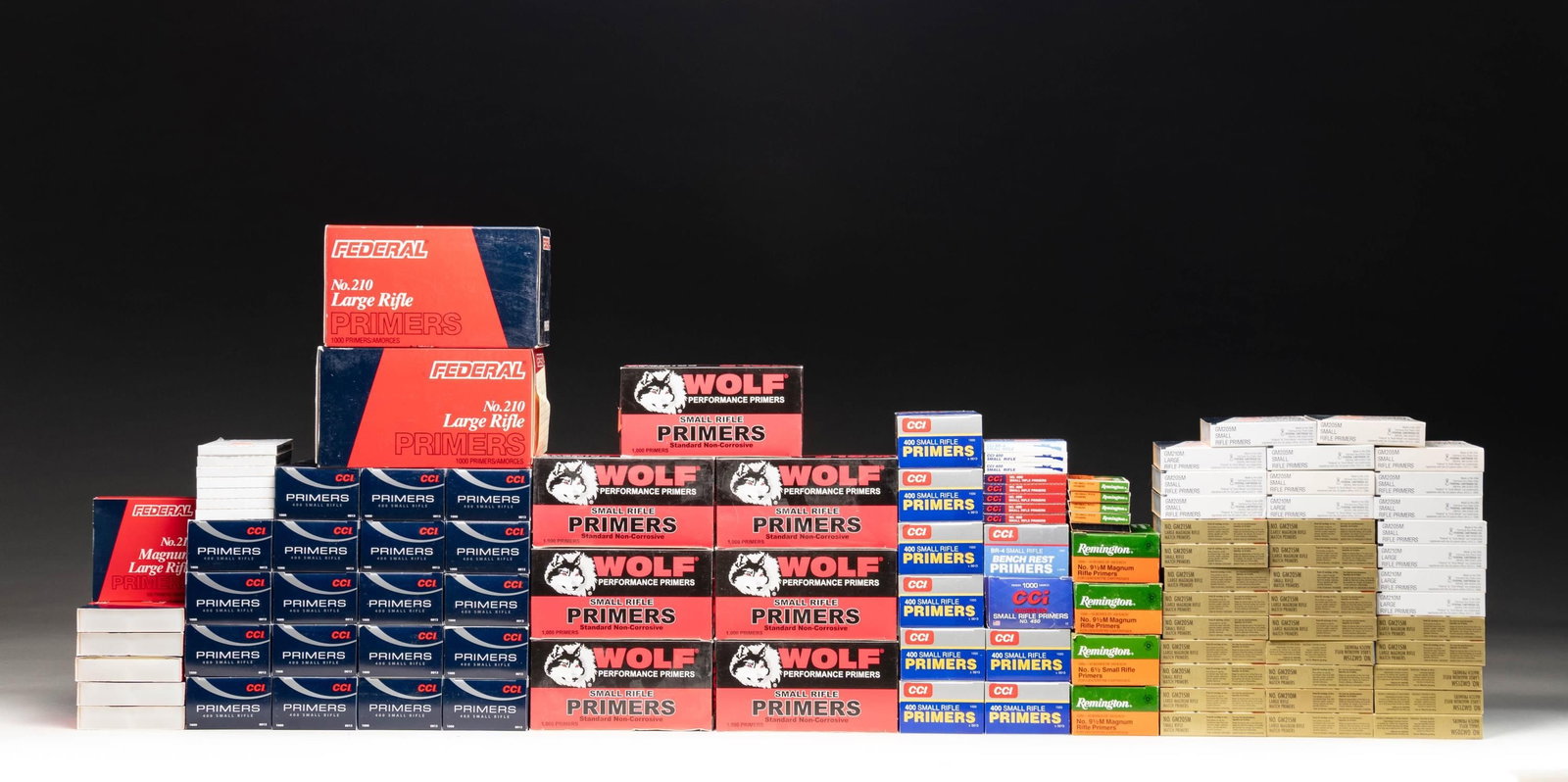 VERY EXTENSIVE GROUPING OF LARGE RIFLE AND SMALL: RIFLE HANDLOADERS PRIMERS. Most primers are in their original factory 1,000 round cartons. Primers are catalogued by stock number, packaging details and colors may vary. LARGE RIFLE: (Federal) No.210