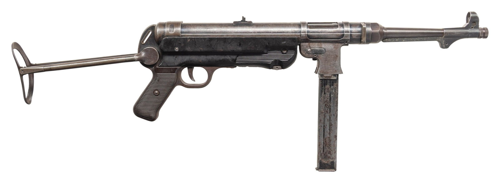 PRE-86 DEALER SAMPLE (KEEPER) MP-40 SUBMACHINE GUN: Cal. 9mm. S# 6223. Bbl. 9 7/8". Standard MP40 sights. Mismatched numbers throughout. Iconic WW2 German SMG. Rear of receiver marked "bnz42" for Steyr 1942. Blued finish. NFA registry lists mfr. as "SI