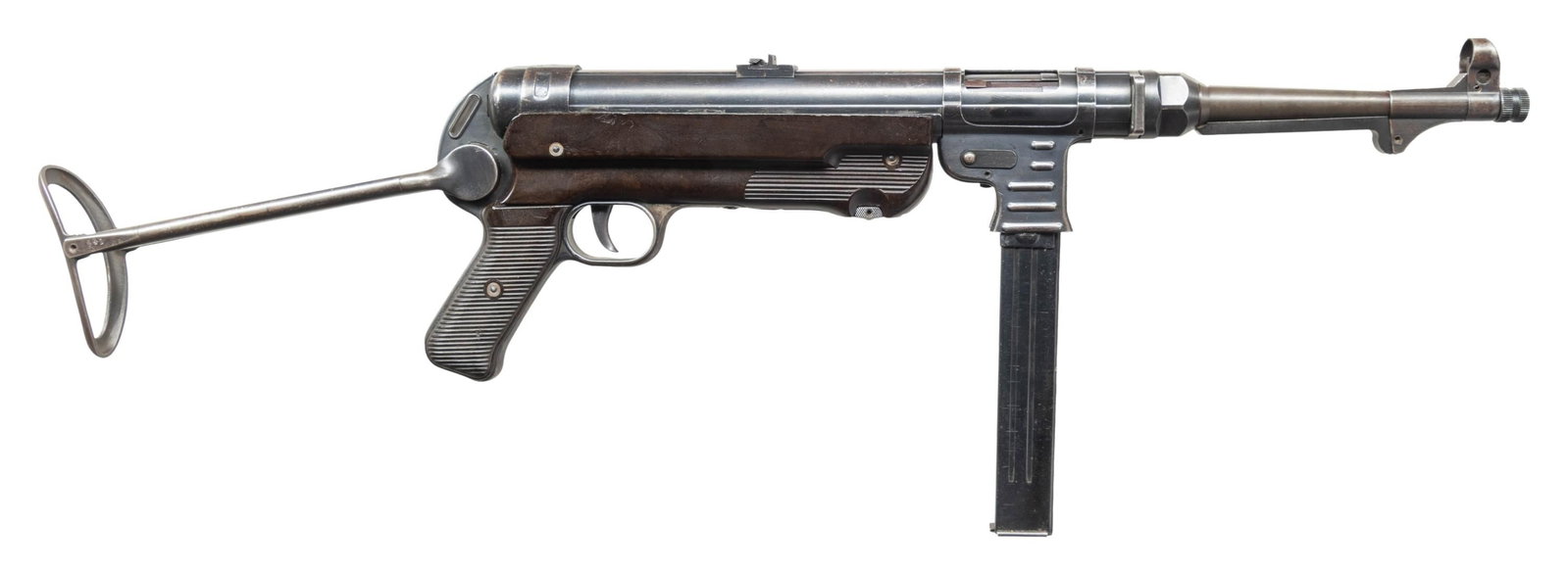 ALL MATCHING GERMAN WWII STEYR "BNZ" CODE "42": DATE MP40 SUBMACHINE GUN. Cal. 9mm (9x19mm). S# 4542d. Bbl. 9 7/8". MP40 submachine gun mfg. by Steyr-Daimler-Puch in 1942. Left side of the receiver is marked with the S# "4542/ d" between x4 Steyr E