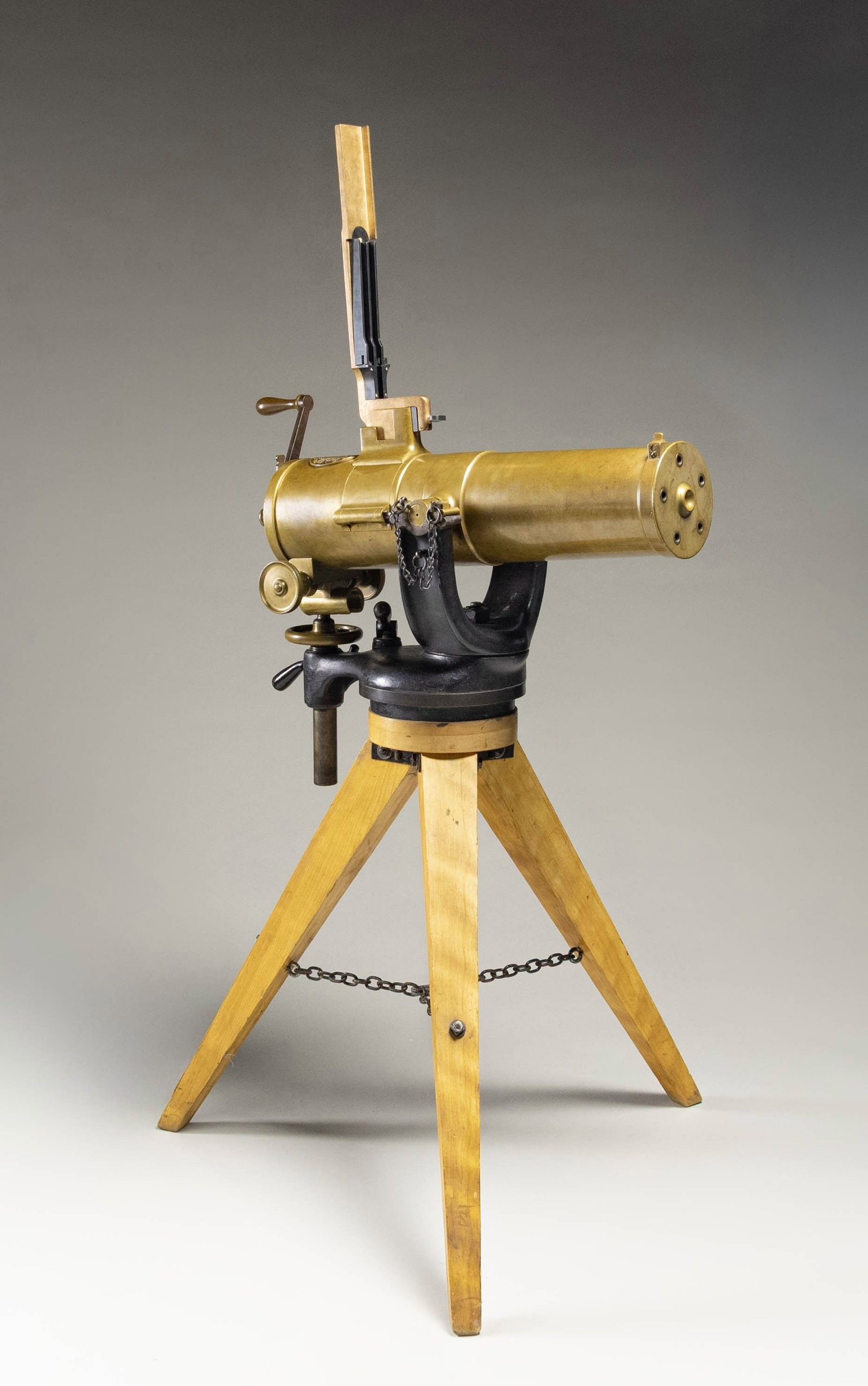EXTREMELY RARE MODEL 1877 COLT "BULLDOG" GATLING: GUN. Cal. 45-70. S# 211. The famous Colt "bulldog" was the most compact gatling gun made to date. It was the first model to come with full brass shroud. 5 18" barrel cluster could fire an amazing 1000
