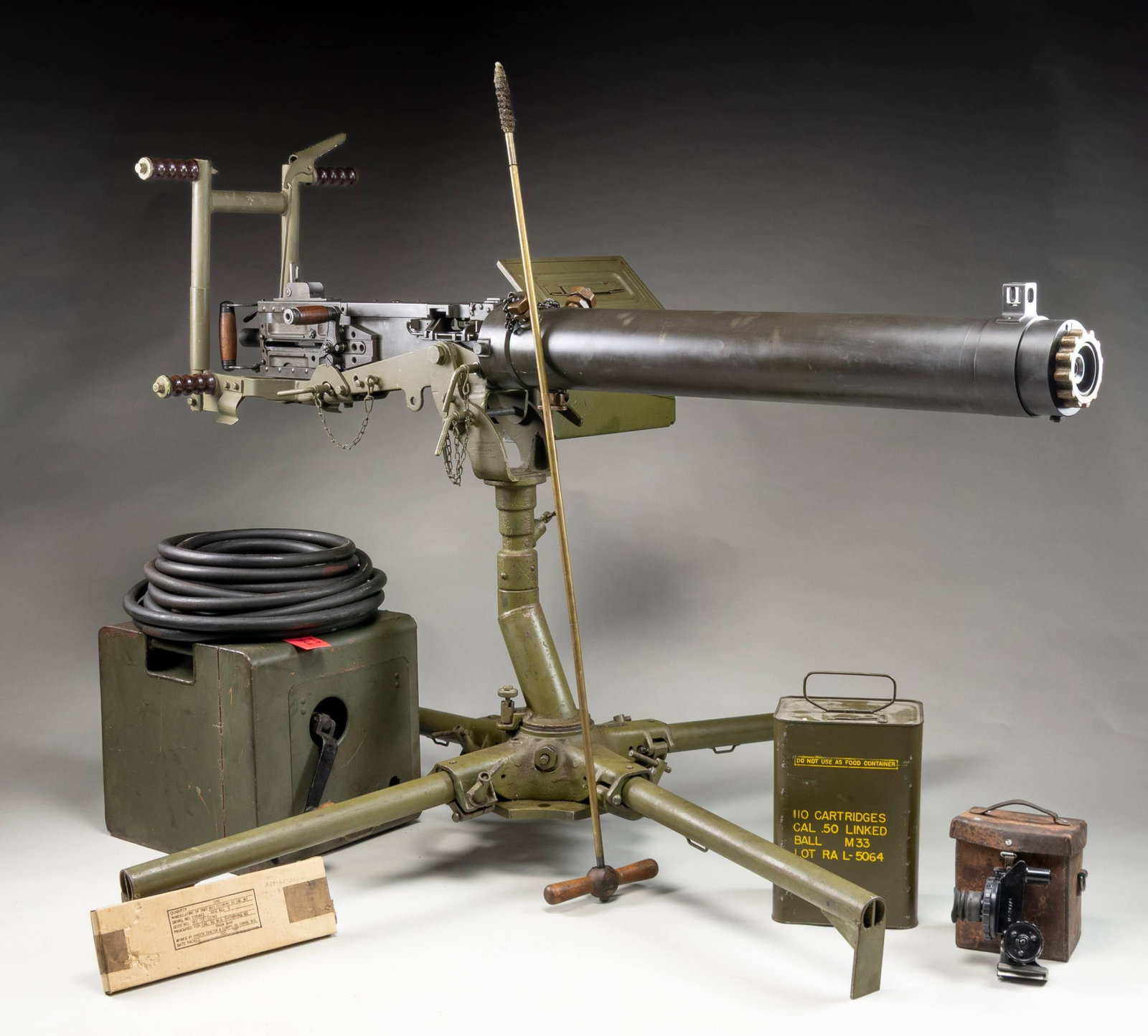FULLY TRANSFERABLE, GORGEOUS, COLT M2 WATER: COOLED HEAVY MACHINE GUN ON ANTI-AIRCRAFT MOUNT WITH ACCESSORIES. Cal. 50 BMG. S# 756402. Bbl. 45". A much less seen water-cooled version of the big "Ma Deuce" mounted on a heavy M63 mount. The Browni