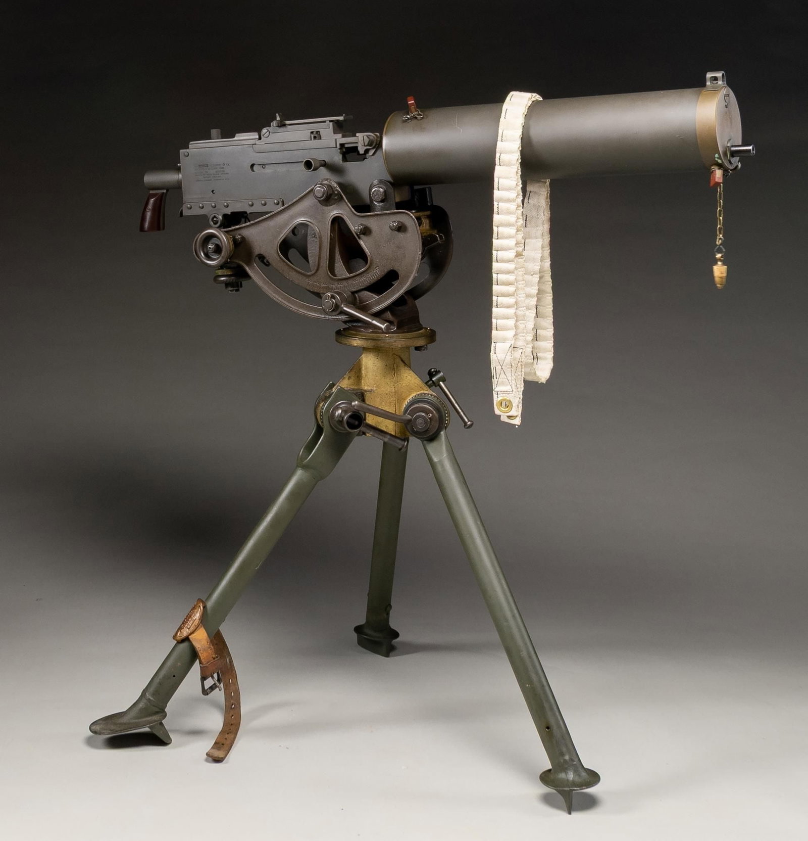 FULLY TRANSFERABLE DLO 1917A1 BROWNING MACHINE GUN: Cal. 30. S# 8019031. Bbl. 24". Hooded blade front sight. Ladder rear sight graduated to 2700yds. DLO 1917A1 Browning built with a mix of military parts. Right sideplate has Rock Island Arsenal & Dougl