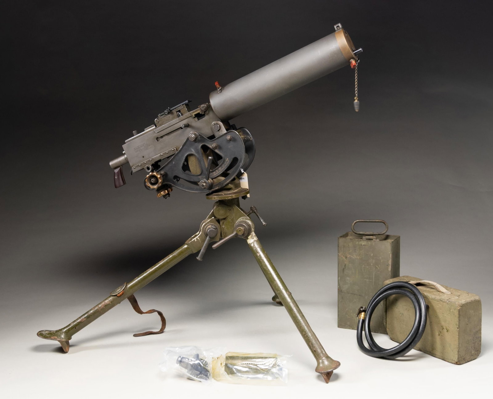 FULLY TRANSFERABLE DLO 1917A1 BROWNING MACHINE GUN: Cal. 30-06. S# 309727. Bbl. 24". Hooded blade front sight. Ladder aperture rear sight graduated to 2600yds.1917A1 Machine gun built with USGI parts & DLO registered right sideplate. Right sideplate ha