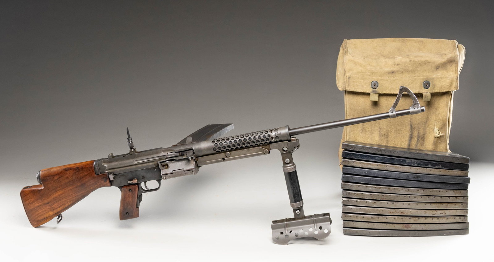 FULLY TRANSFERABLE CURIO JOHNSON MODEL 1944: LIGHT MACHINE GUN. Cal. 30-06. S# 2695NAC. Bbl. 22". This hard fought contender for United States Military acceptance is as rare as it is desirable. Chambered in 30-06 & mag. fed from the left side, i